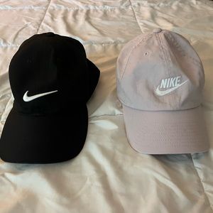 One Black Nike Hate and One Lavander Nike Hate